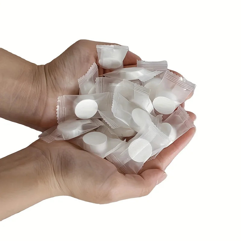 50 قطعة مناشف مضغوطة محمولة للاستخدام مرة واحدة لتنظيف الوجه ومناديل ناعمة مضغوطة لتنظيف اليدين ومناديل مكياج غير منسوجة