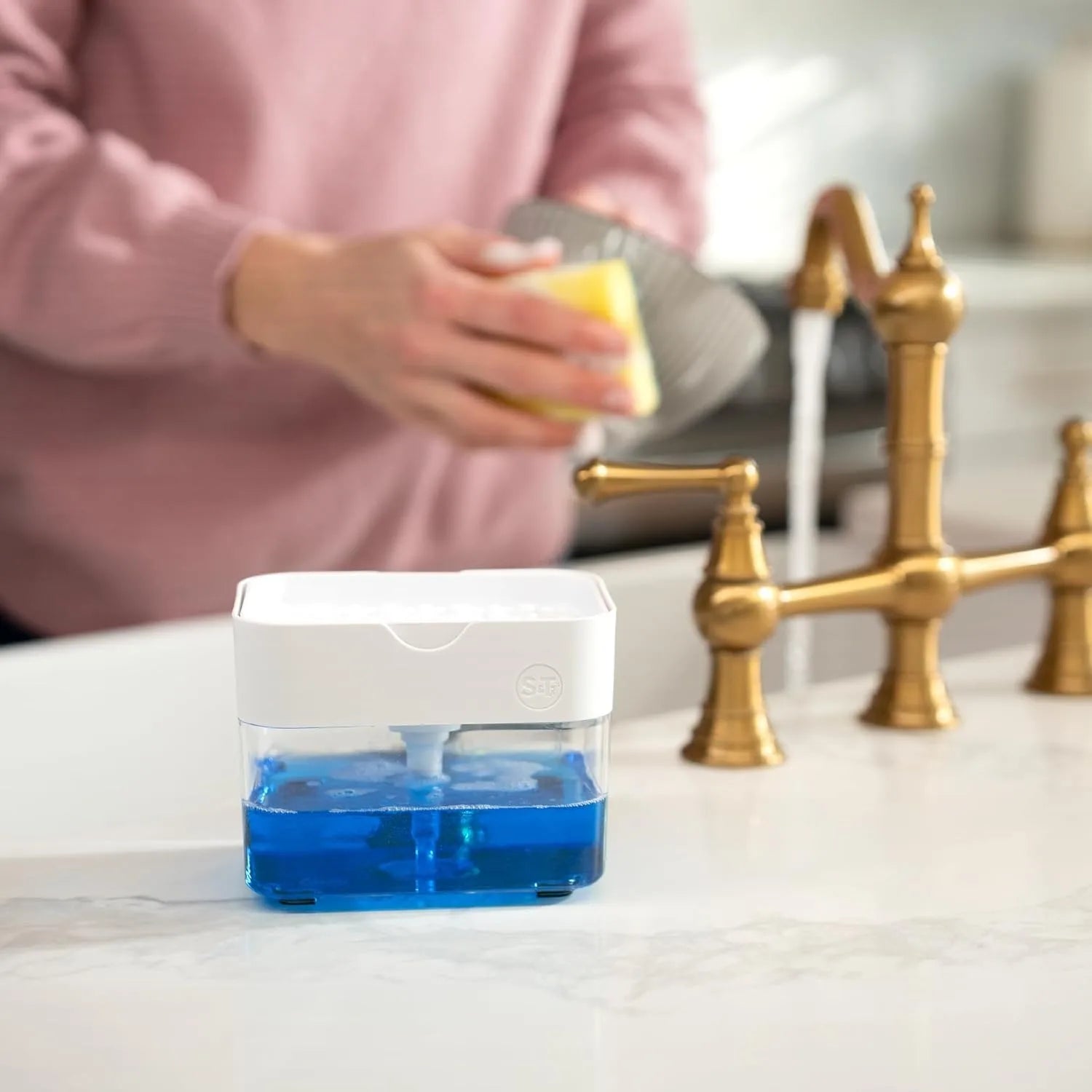 The home kitchen sink dishwashing soap dispenser with sponge holder is used for storing and dispensing liquid cleaning agents vi