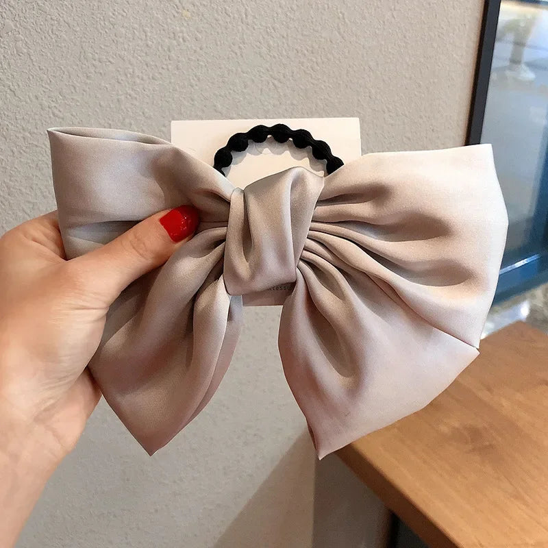 Grands nœuds de soie Bandes de cheveux élastiques Cravées grandes bandes de caoutchouc solides Chouchous Pinces à cheveux pour femmes Filles Barrettes Accessoires pour cheveux
