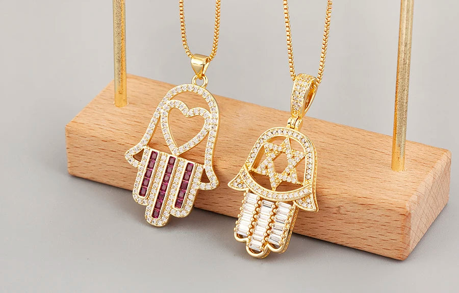 قلادة على شكل قلب/نجمة من الكريستال التركي من AIBEF قلادة على شكل كف يد وحمة من النحاس والزركون مجوهرات للنساء كهدية للبيع بالجملة مع شحن مباشر