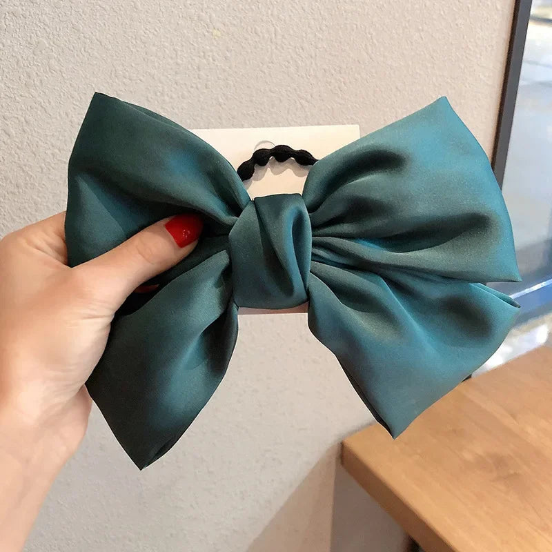 Grands nœuds de soie Bandes de cheveux élastiques Cravées grandes bandes de caoutchouc solides Chouchous Pinces à cheveux pour femmes Filles Barrettes Accessoires pour cheveux