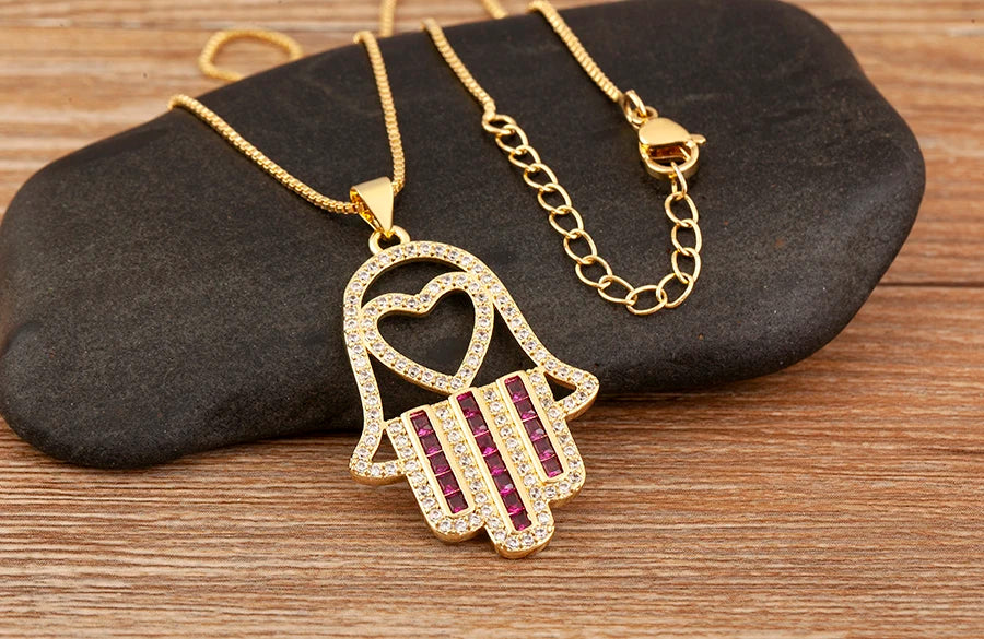 قلادة على شكل قلب/نجمة من الكريستال التركي من AIBEF قلادة على شكل كف يد وحمة من النحاس والزركون مجوهرات للنساء كهدية للبيع بالجملة مع شحن مباشر