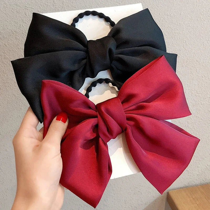 Grands nœuds de soie Bandes de cheveux élastiques Cravées grandes bandes de caoutchouc solides Chouchous Pinces à cheveux pour femmes Filles Barrettes Accessoires pour cheveux